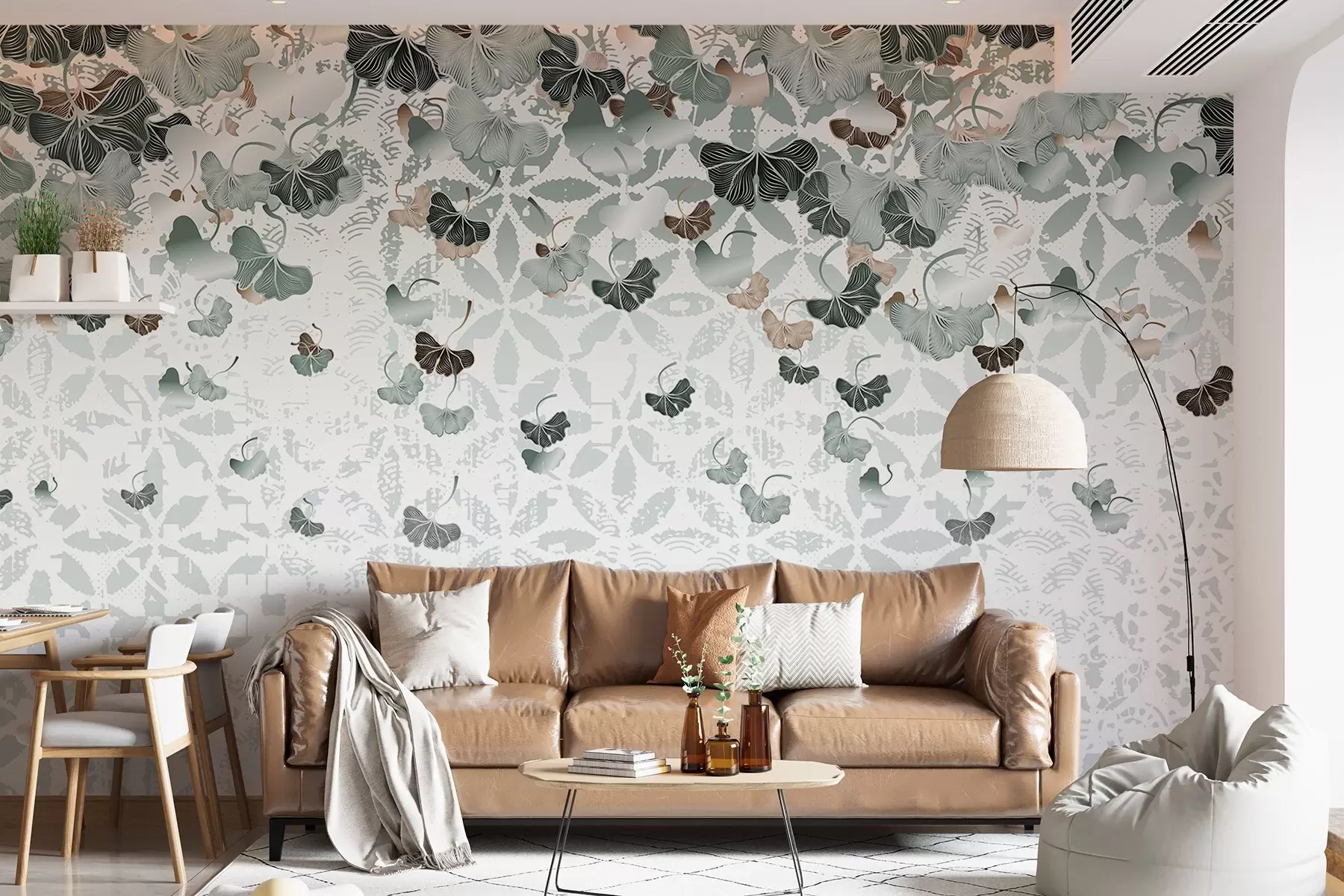 Fototapete Kaskadenförmige Ginkgoblätter in Grün- und Brauntönen vor einem strukturierten Hintergrund mit floralen Motiven w08662