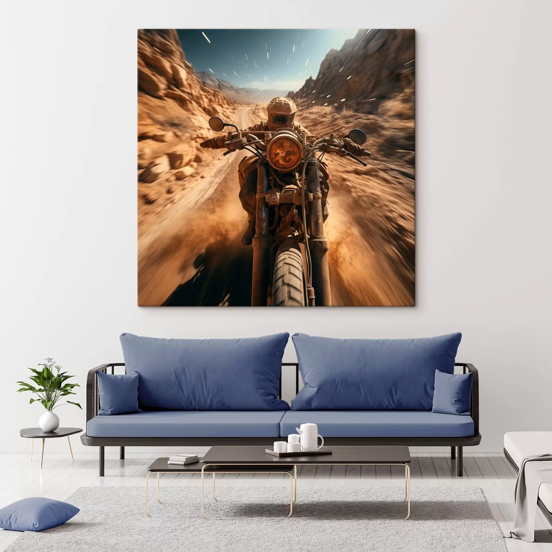 Wandbilder Motorradfahrer, der eine Wüstenstraße entlang rast s44361