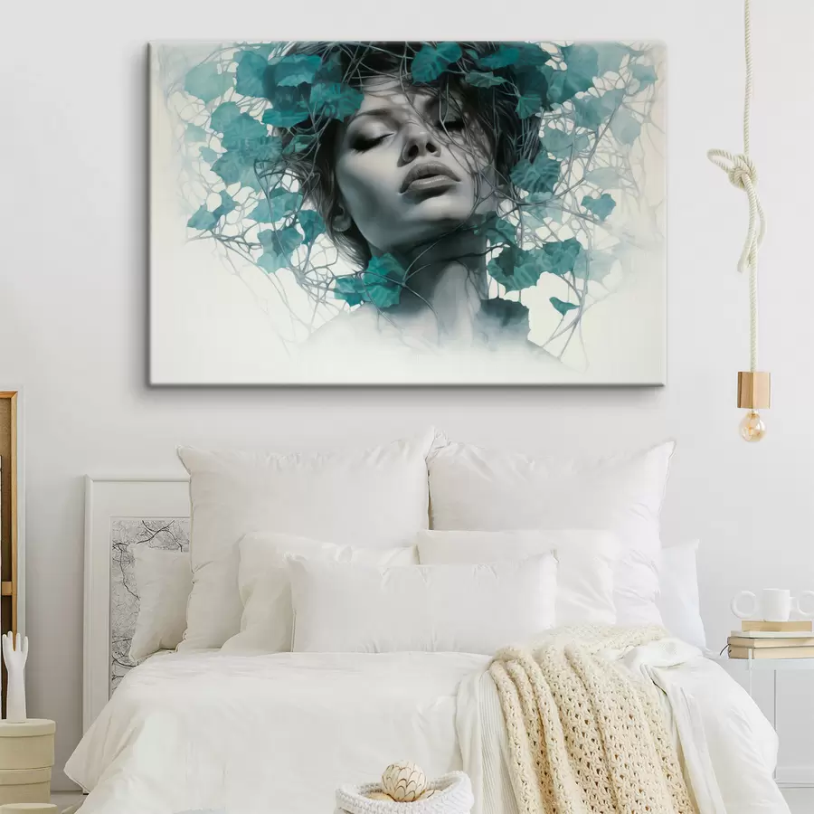 Wandbilder Porträt einer Frau mit geschlossenen Augen, umgeben von grünen Blättern und Zweigen s44399