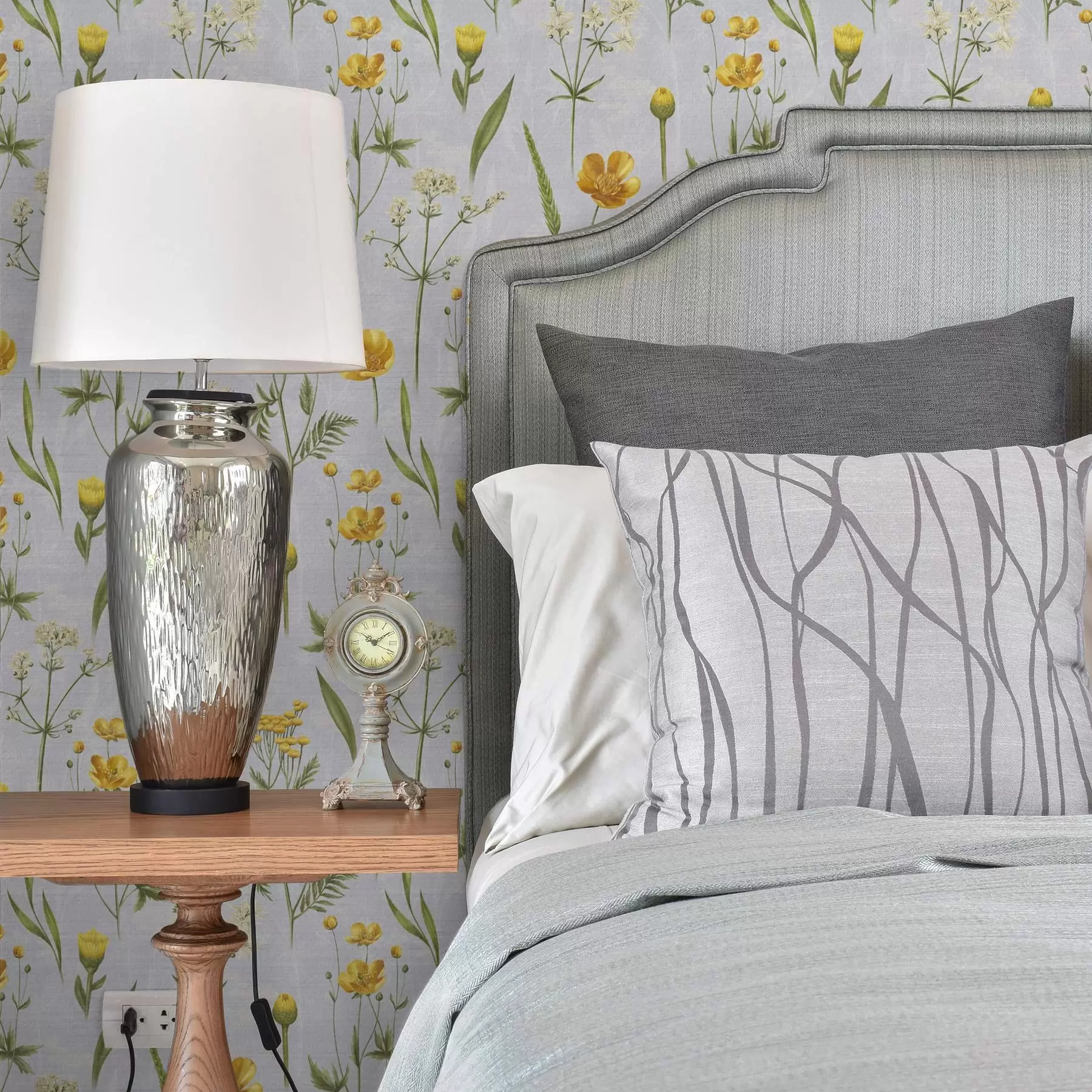 Fototapete Gelbe Blumen und Grünzeug auf einem hellgrauen Hintergrund a00472