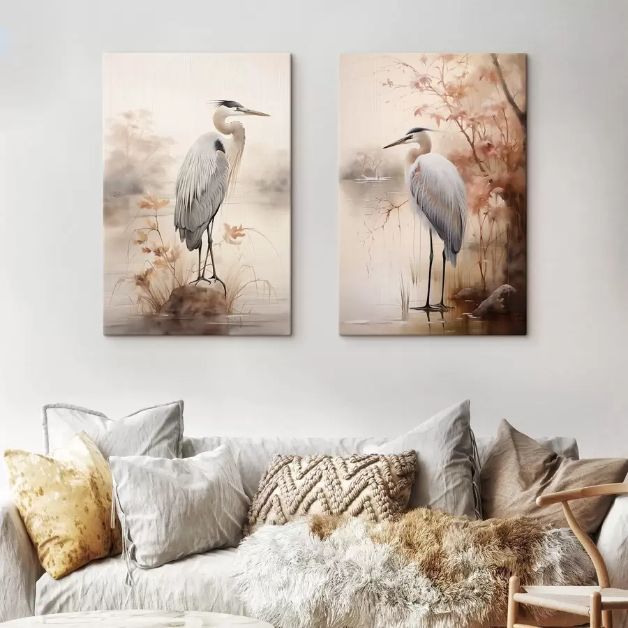 Wandbilder Ein Reiher steht auf einem Felsen in einem See, im Hintergrund hohe Gräser und Bäume. m01239