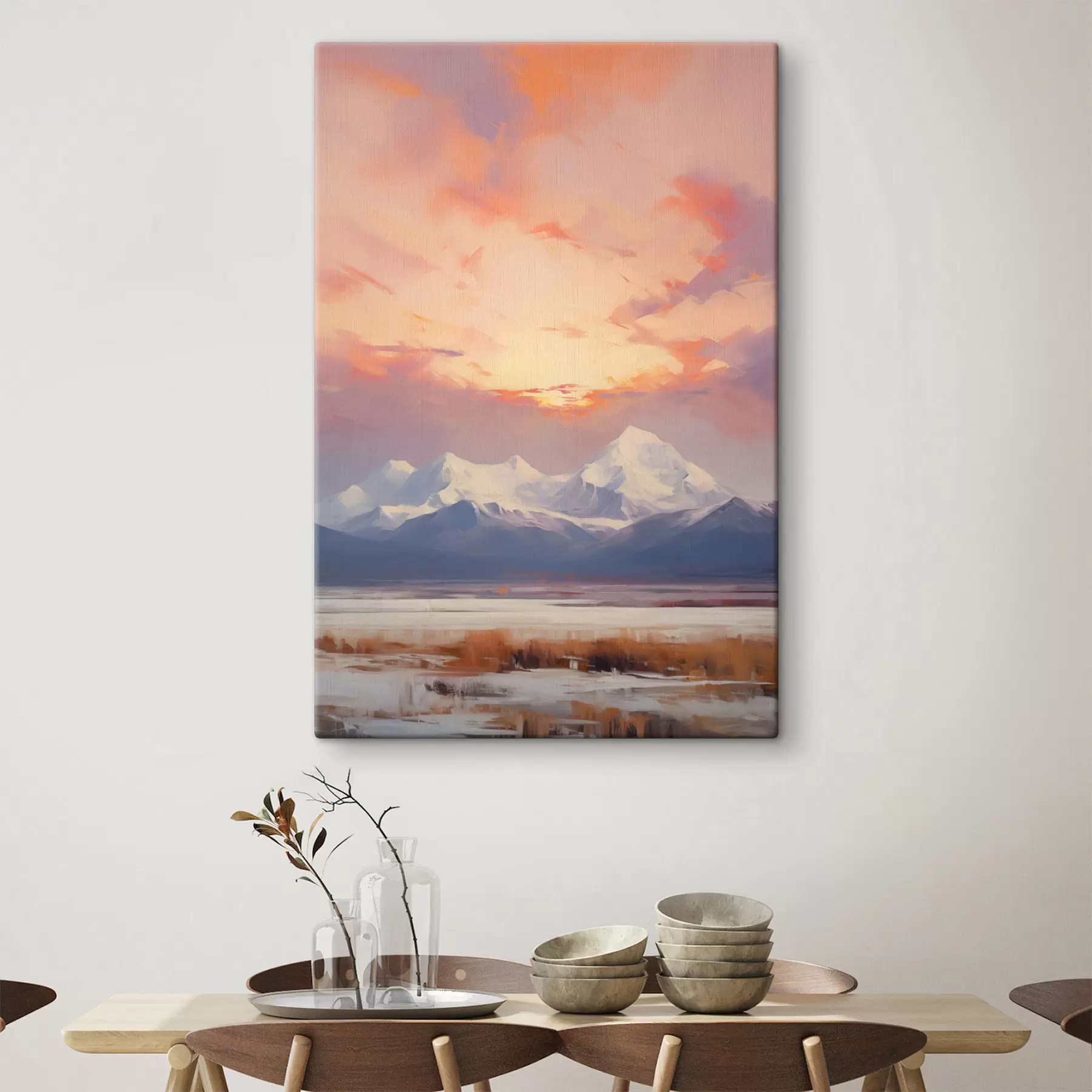 Wandbilder Schneebedeckte Berge unter einem leuchtend orange-rosa Himmel mit Wolken s48742